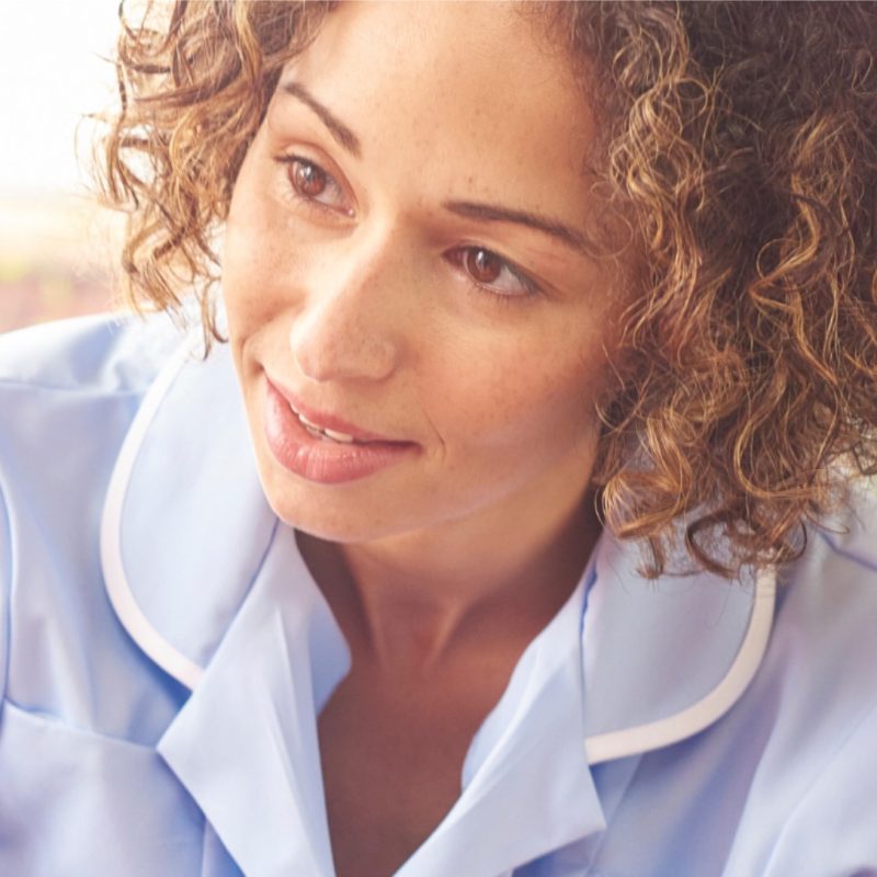 Young female nurse, listening