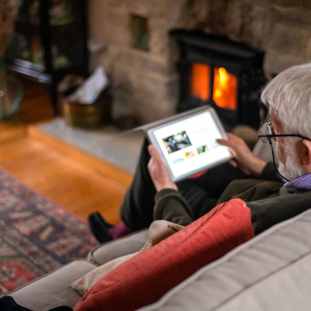 Older man using tablet