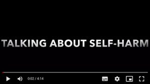 Screen showing title of 'Talking About Self-Harm' video