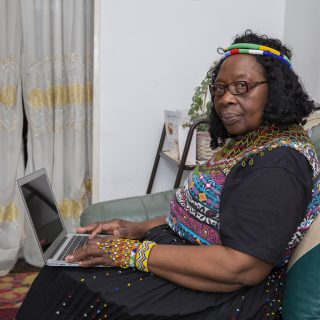 Woman using laptop at home