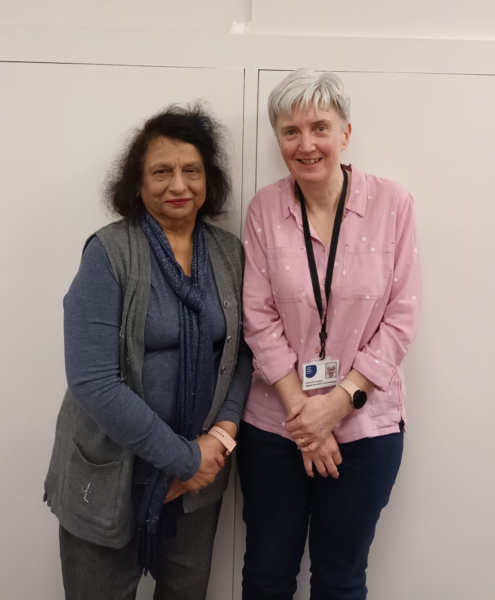 Two women standing next to each other.