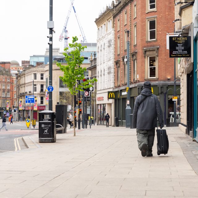 Image is a photo of Leeds Boar Lane facing towards the train station
