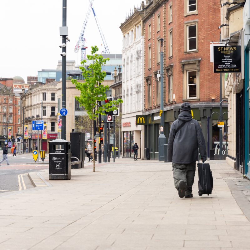 Image is a photo of Leeds Boar Lane facing towards the train station