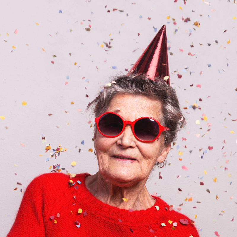 Lady with a party hat and glasses